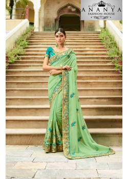 Charming Light Green Georgette Saree with Dark Green Blouse