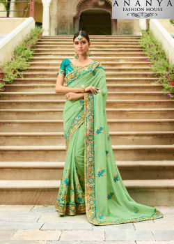 Charming Light Green Georgette Saree with Dark Green Blouse