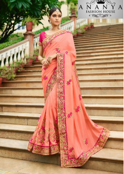 Dazzling Orange Georgette Saree with Pink Blouse