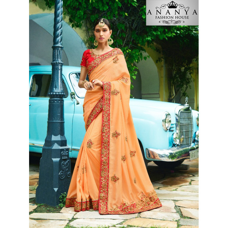 Incredible Orange Georgette Saree with Red Blouse
