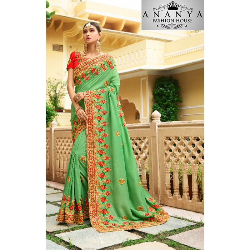 Melodic Green Georgette Saree with Pink Blouse