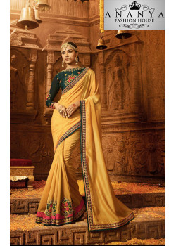 Adorable Yellow Georgette Saree with Dark Green Blouse