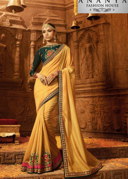 Adorable Yellow Georgette Saree with Dark Green Blouse