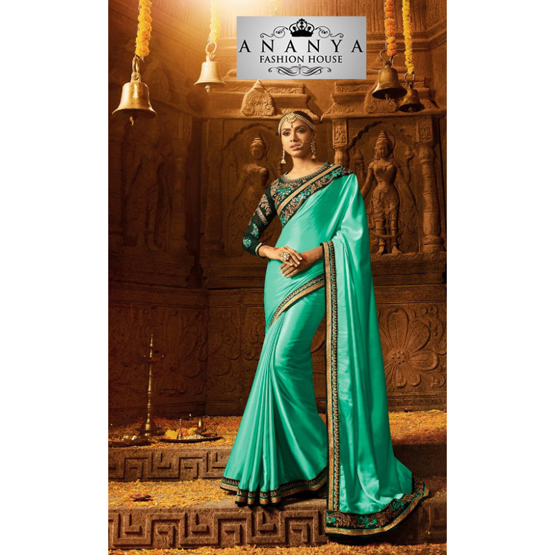 Luscious Light Green Georgette Saree with Dark Green Blouse