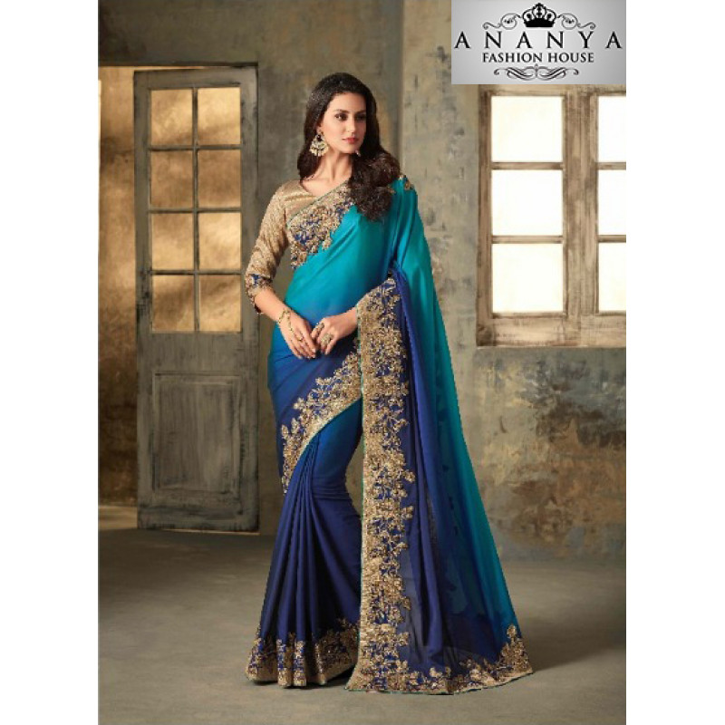 Enigmatic Blue Shaded Rangoli Saree with Brown Blouse