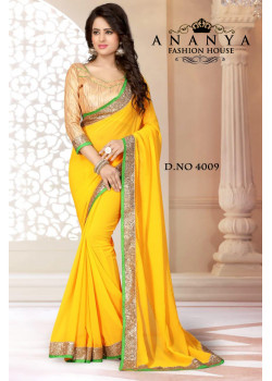 Enigmatic Green Georgette Saree with Gold Blouse