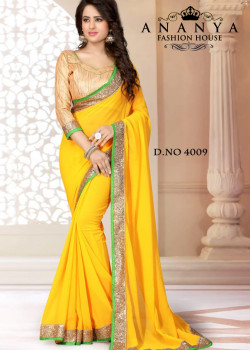 Enigmatic Green Georgette Saree with Gold Blouse