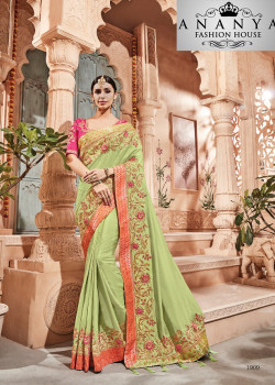 Enigmatic Green Georgette Saree with Pink Blouse