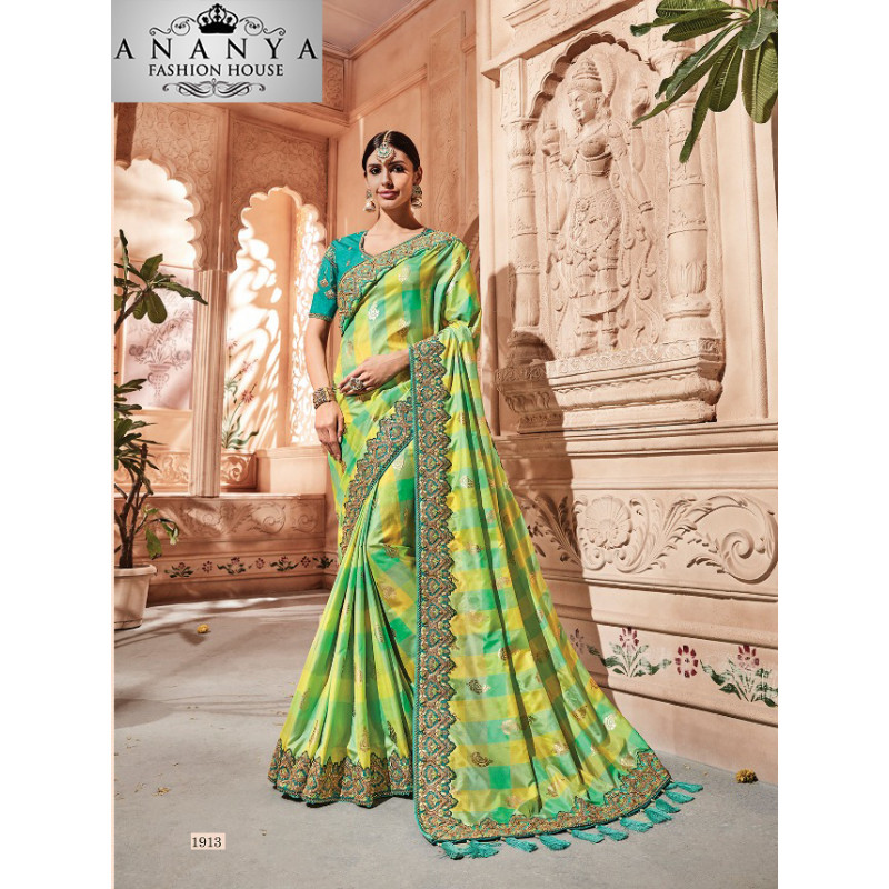 Flamboyant yellow Georgette Saree with Green Blouse