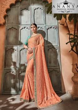 Melodic Orange Georgette Saree with Blue Blouse