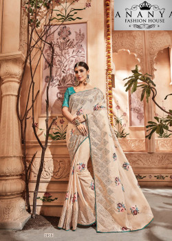 Trendy White Georgette Saree with Blue Blouse