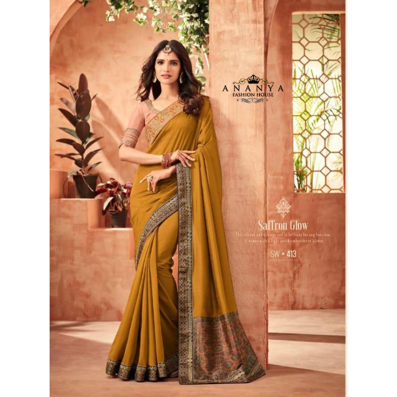 Divine Yellow Nyraa Silk Saree with Pink Blouse