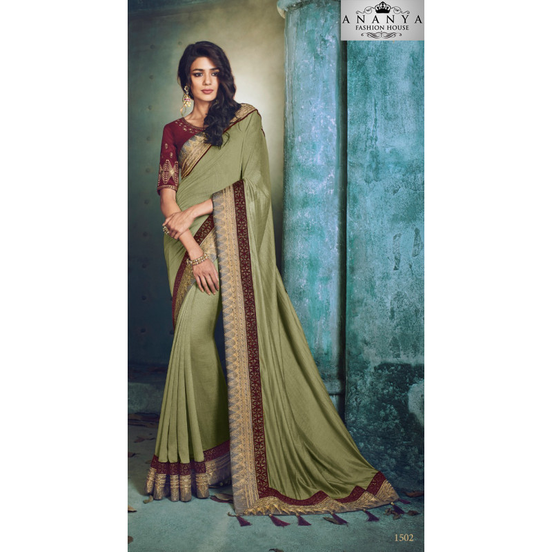 Adorable Green Georgette Saree with Maroon Blouse