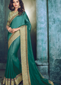 Divine Blue Georgette Saree with Green Blouse