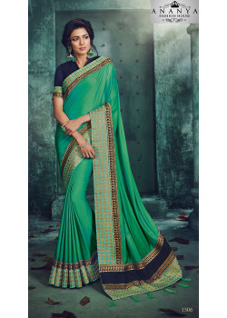 Melodic Green Georgette Saree with Dark Blue Blouse
