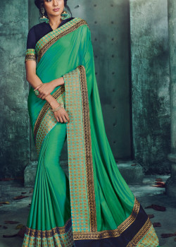 Melodic Green Georgette Saree with Dark Blue Blouse