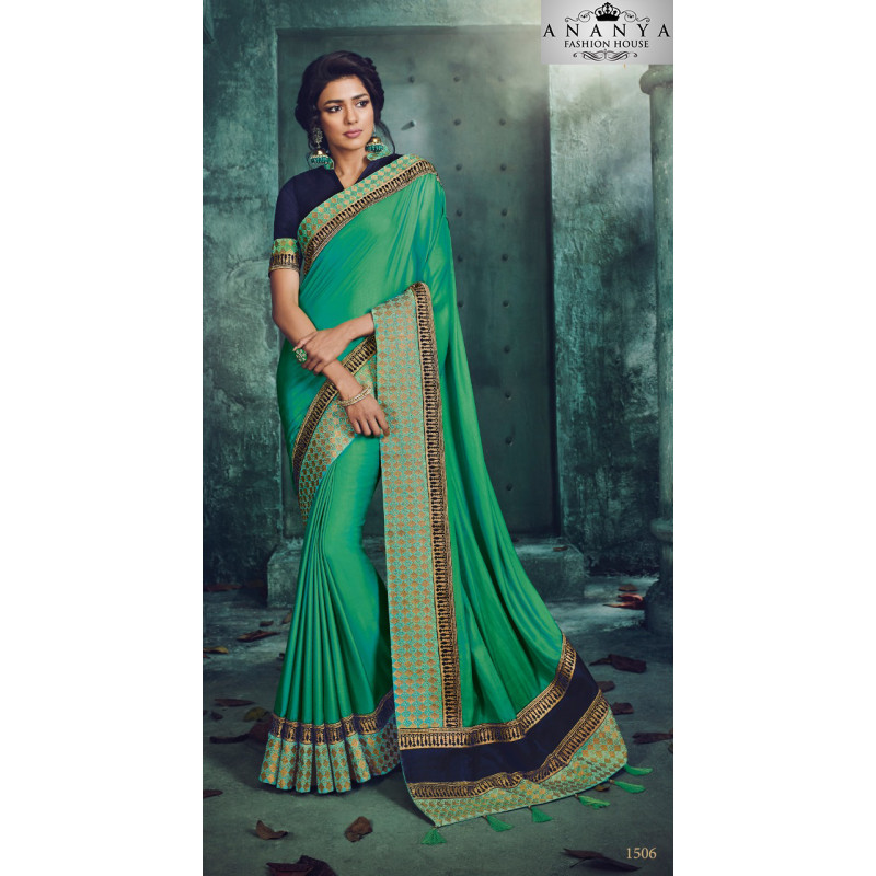 Melodic Green Georgette Saree with Dark Blue Blouse