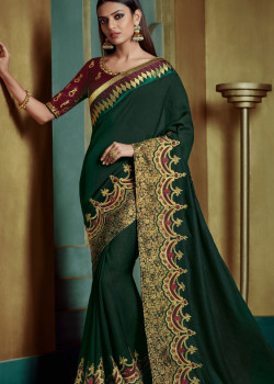 Exotic Dark Green Georgette Saree with Maroon Blouse