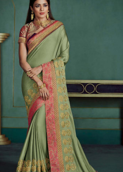 Luscious Green Georgette Saree with Pink Blouse