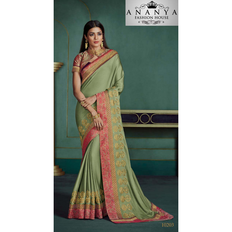 Luscious Green Georgette Saree with Pink Blouse