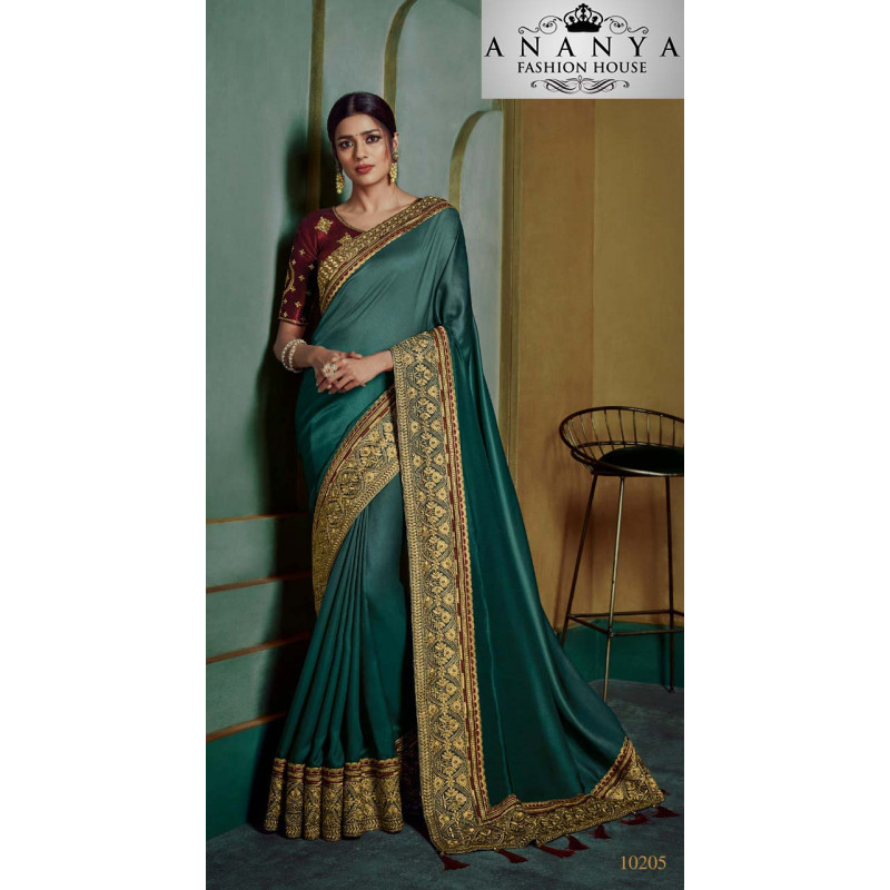 Melodic Dark Green Georgette Saree with Maroon Blouse