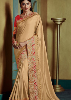 Melodic Yellow Georgette Saree with Pink Blouse