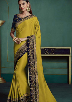 Trendy Yellow Georgette Saree with Dark Blue Blouse