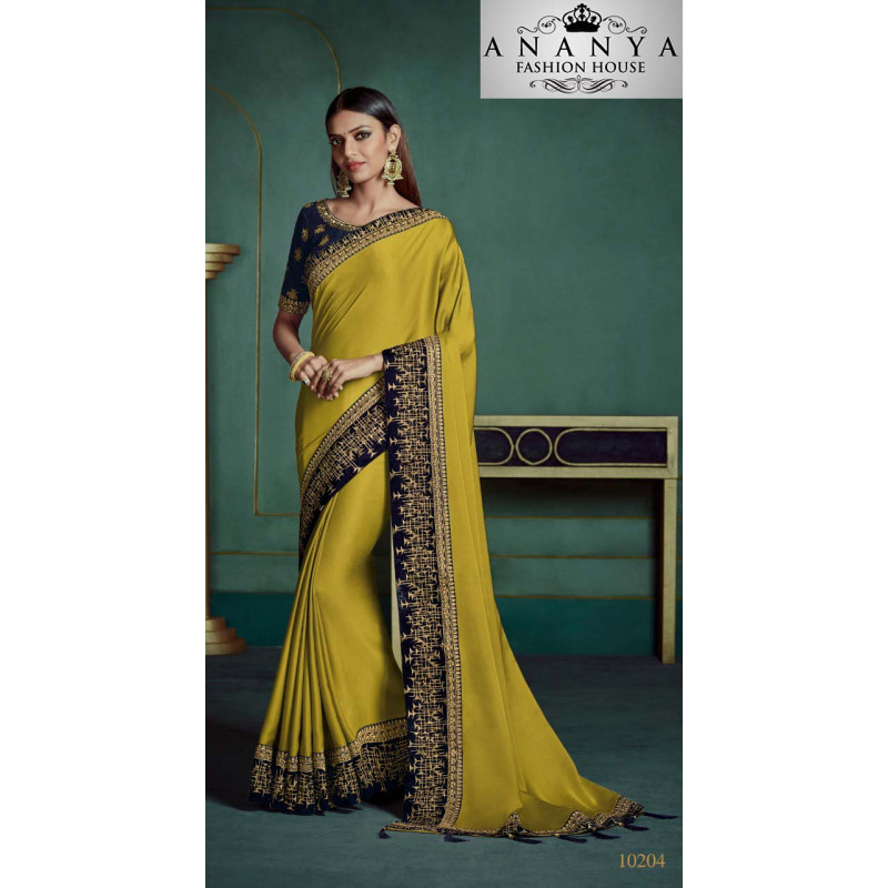 Trendy Yellow Georgette Saree with Dark Blue Blouse