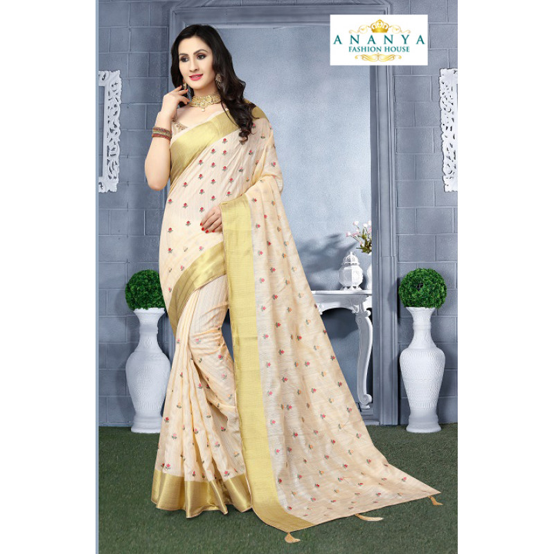 Melodic Off White Silk Saree with Beige Blouse