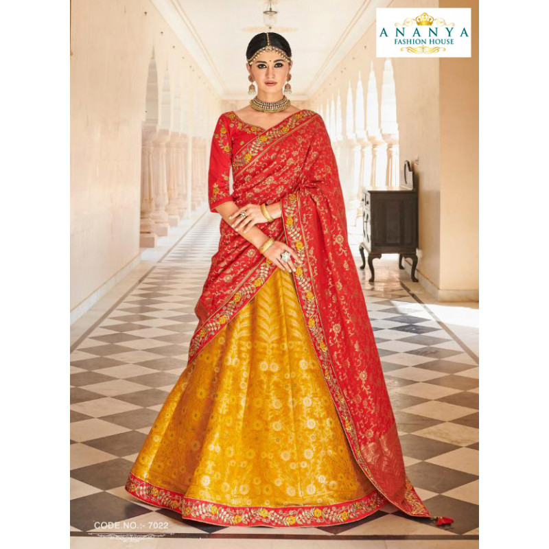 Dazzling Yellow color Banarasi Tissue Designer Lehenga