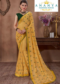 Trendy Yellow Silk Saree with Bottle Green Blouse