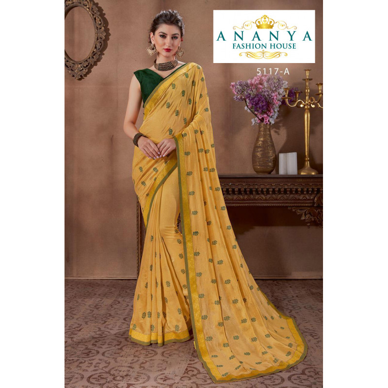 Trendy Yellow Silk Saree with Bottle Green Blouse