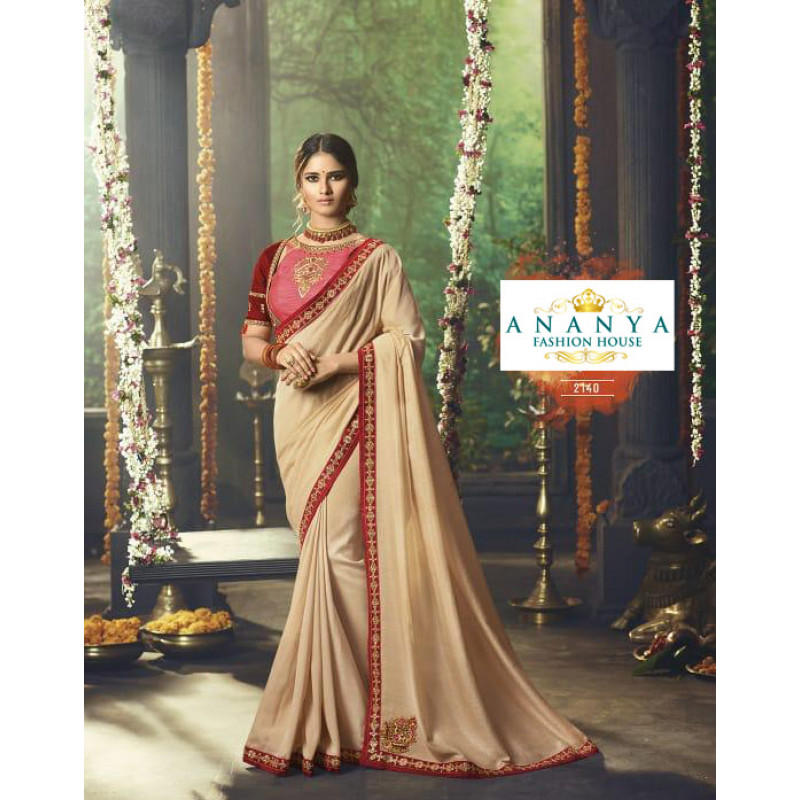 Adorable Beige Silk Saree with Pink- Red Blouse