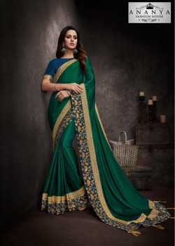 Enigmatic Bottle Green Silk Saree with Blue Blouse
