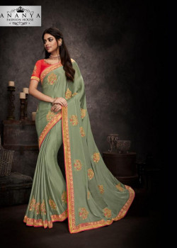 Magnificient Pastel Green Silk Saree with Red Blouse