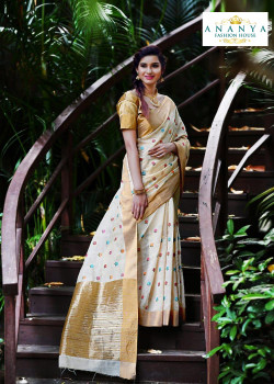 Flamboyant Off White Silk Saree with Gold Blouse
