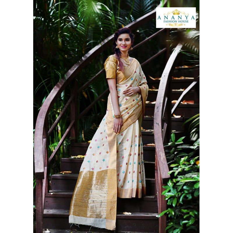 Flamboyant Off White Silk Saree with Gold Blouse
