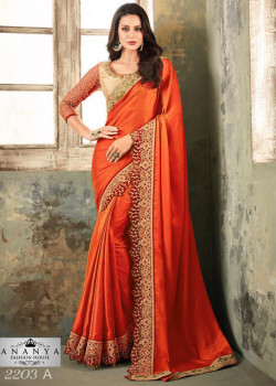Charming Orange Silk Saree with Gold Blouse
