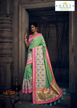 Divine Pista Green Silk Saree with Pink Blouse
