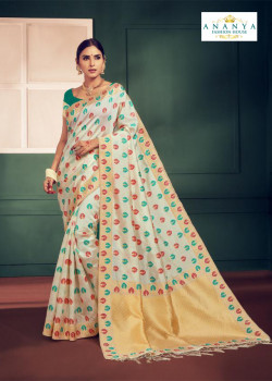 Flamboyant Whiite Silk Saree with Rama Green Blouse