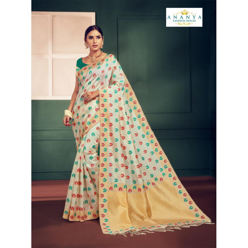 Flamboyant Whiite Silk Saree with Rama Green Blouse