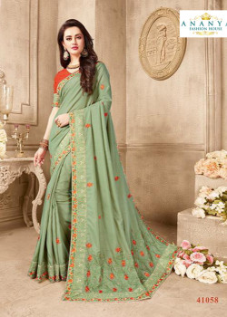 Enigmatic Pastel Green Silk Saree with Orange Blouse
