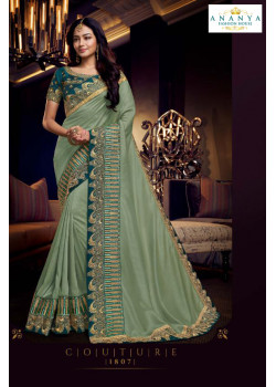 Adorable Pastel Green Silk Saree with Turquoise Blouse