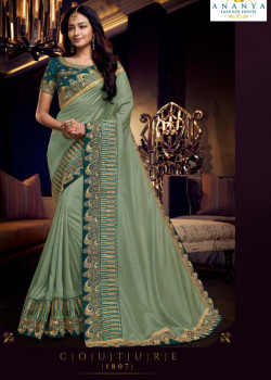Adorable Pastel Green Silk Saree with Turquoise Blouse