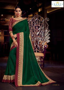 Enigmatic Bottle Green Silk Saree with Maroon Blouse