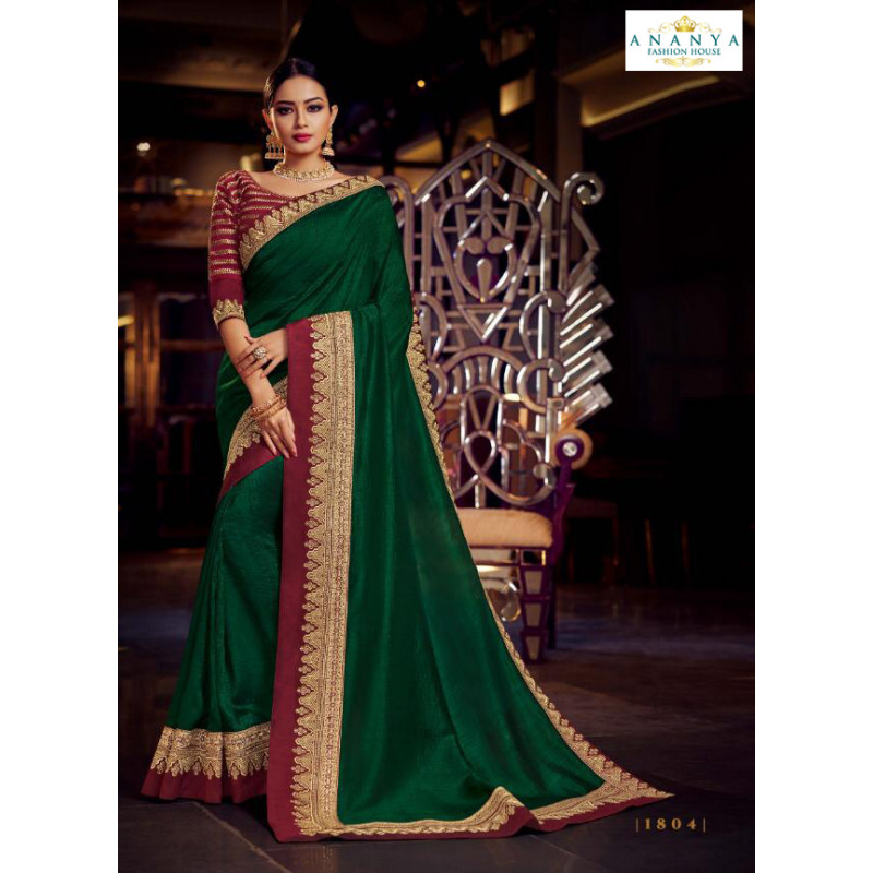 Enigmatic Bottle Green Silk Saree with Maroon Blouse