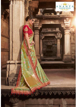 Exotic Pista Green Silk modal Saree with Red Blouse