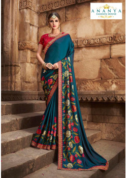 Luscious Turquoise Silk modal Saree with Red Blouse